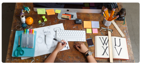 A student works at a creative workspace